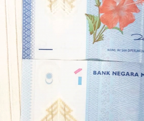 Faded ringgit notes not fake: BNM