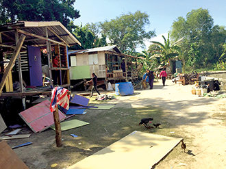 KK squatters identified; 20 homes in Sandakan smashed