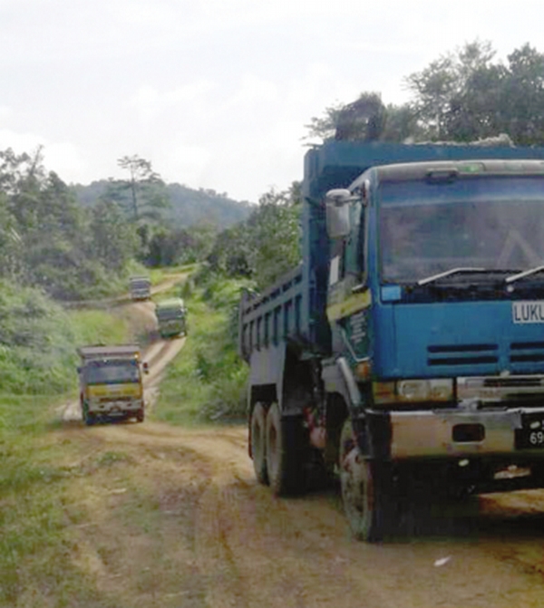 Long Pasia folks slam logging trucks for damaging road