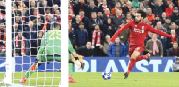 Salah strike takes Reds into into last 16