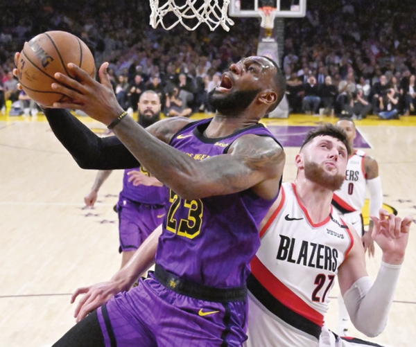 LeBron passes Chamberlain  as Lakers sink Blazers