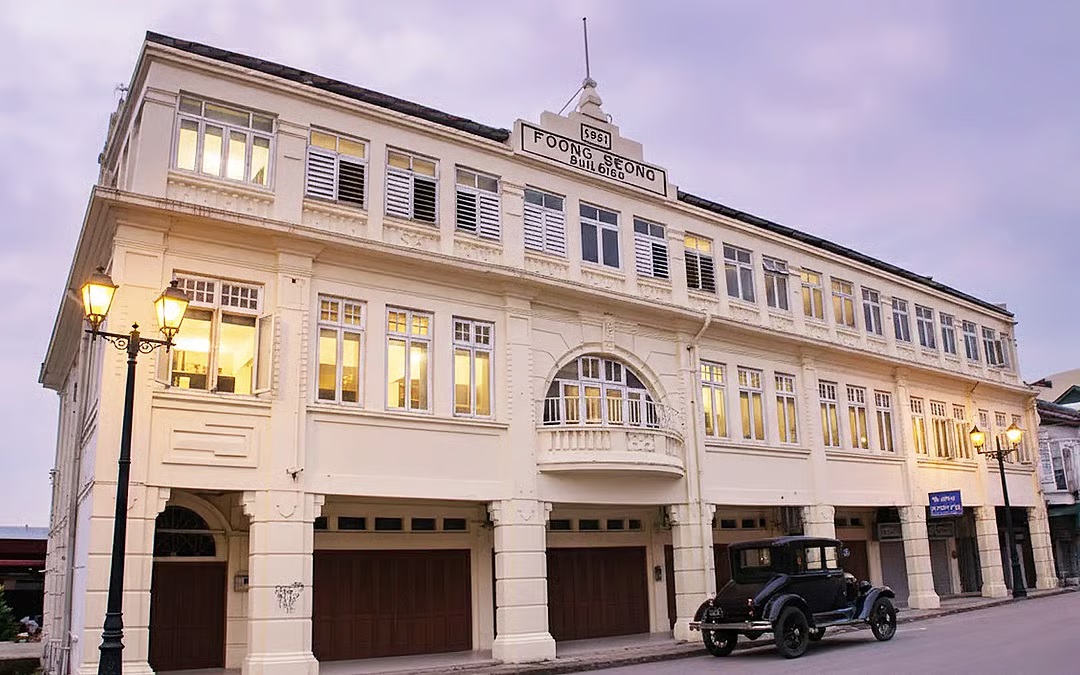 Yong hopes that initiatives like his AI restoration of the Foong Seong building in Ipoh will inspire real-life change. (Wikimedia Commons pic & Mark Yong AI pic)
