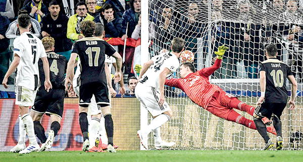 Ajax stun Ronaldo’s Juve to reach semis