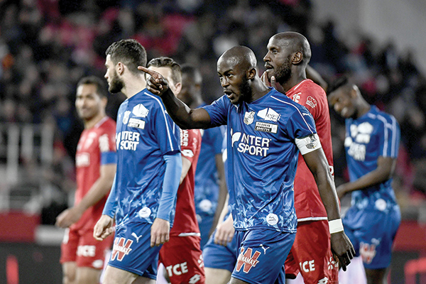 Racist chants half relegation  battle and Lyon crash again