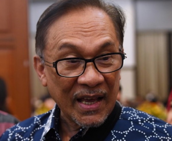 Hold talks, Anwar tells Bersatu, Warisan