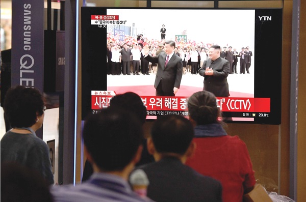 Xi meets Kim in Pyongyang ahead of Trump talks