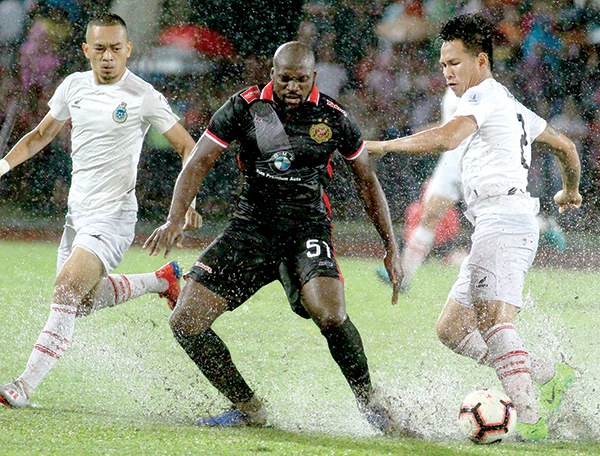 Sabah celebrate title with win