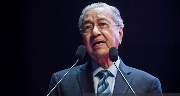 Dr M hints may decide to continue