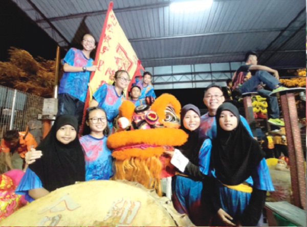 Hijab girls display prowess at Tuaran lion dance