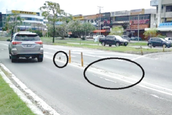 Flexi-posts in Towering  run over by errant drivers