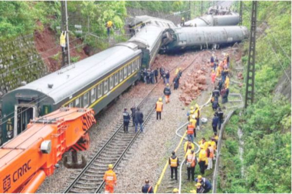 Train derailed by landslide debris