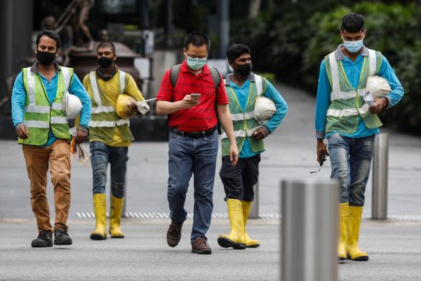 Singapore to rely less on foreign workers