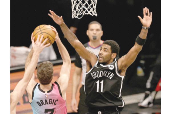 Nets hold on to beat shorthanded Heat