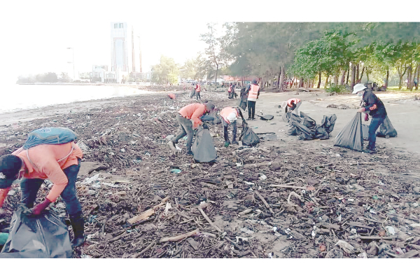 Likas beach cleared of 54 tonnes of trash