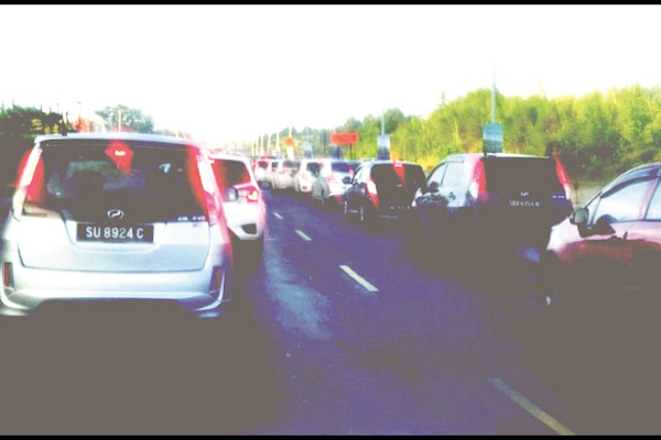 Daily hour-long Telipok traffic jam irks motorists