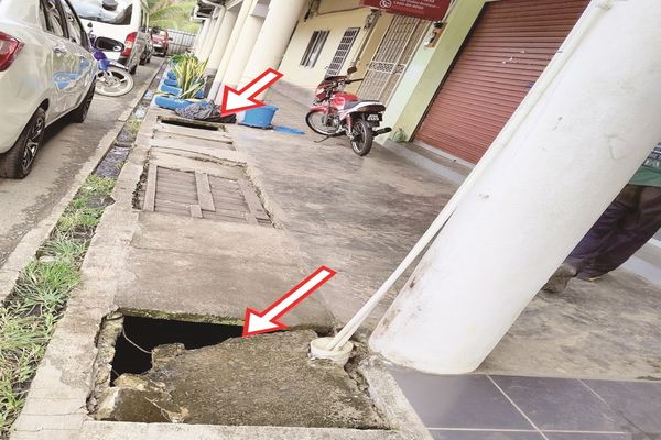 Missing slabs on Kunak, Penampang walkways