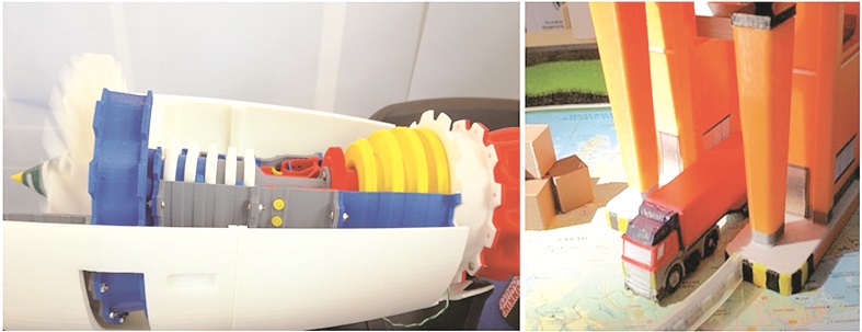 3D printed model of working jet engine and building.