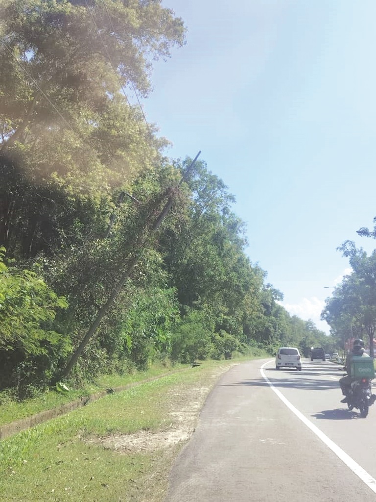 The pole in this part of Kepayan looked as if it could fall over at any time.