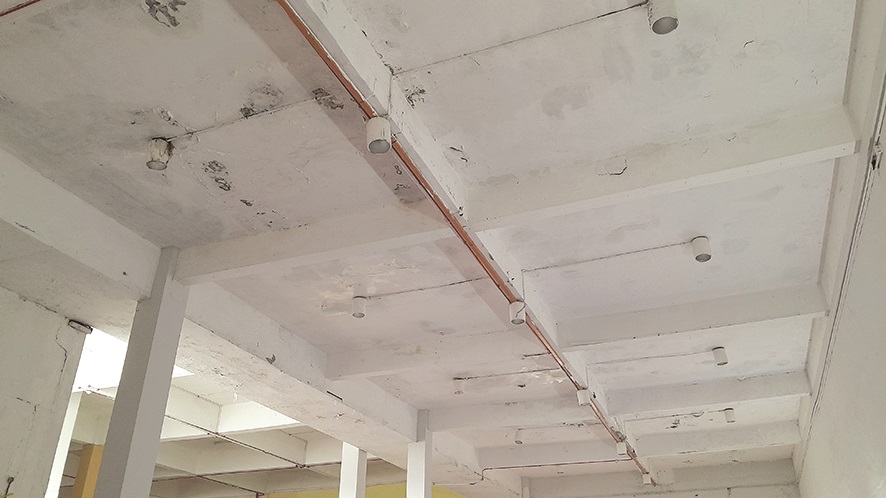 The state of the training area due to water leaking from the ceilings. 