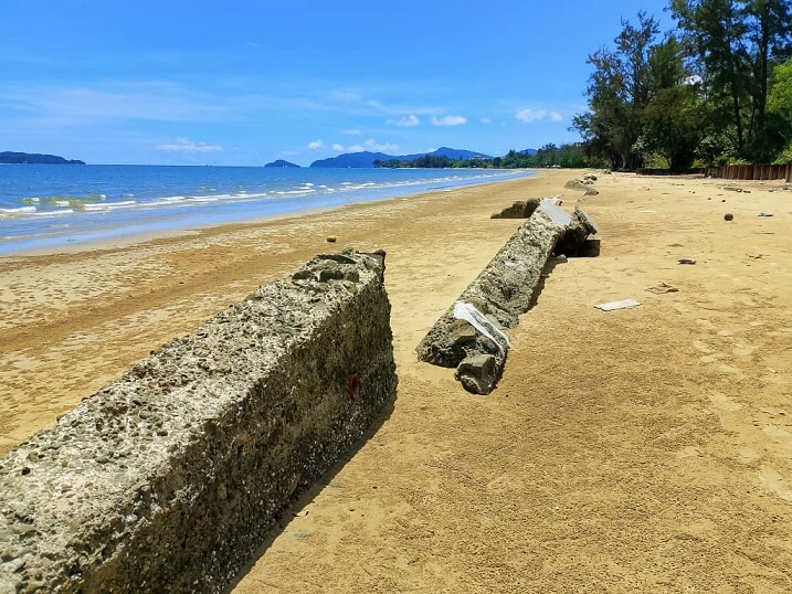 Remnants of wave barriers built during the Berjaya government era at Tanjung Aru Beach in Kota Kinabalu.  