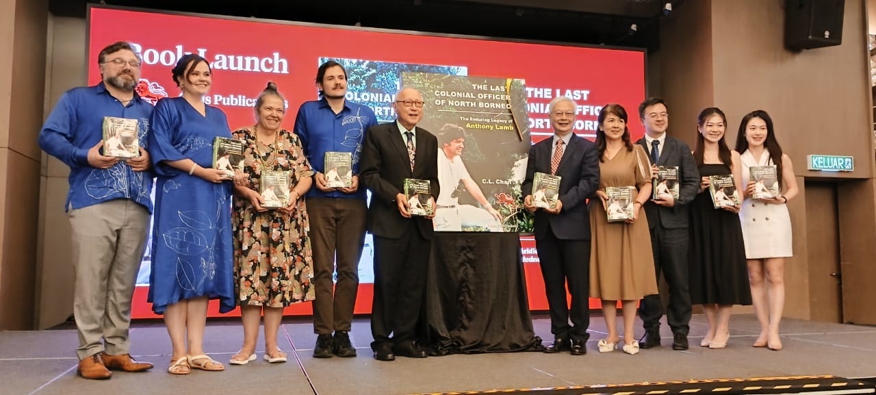 A momentous book launch line-up on stage (from left) Aaron Harrison, Serena, Datin Anthea Phillipps, Alex, Tan, CL Chan, Datin, children Hin Ching, Shuk Ling, Shuk Mun. 