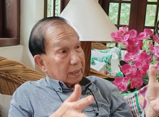 Dr Chok gestures during the interview. He believes growth must never come at the expense of long-term liveability. (Pic by Kan Yaw Chong)