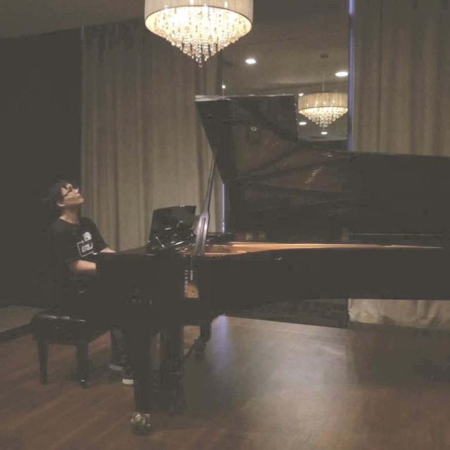 Gabriel says music should exist because someone has something meaningful to say – not just algorithms. Here, he’s seen playing a grand piano.