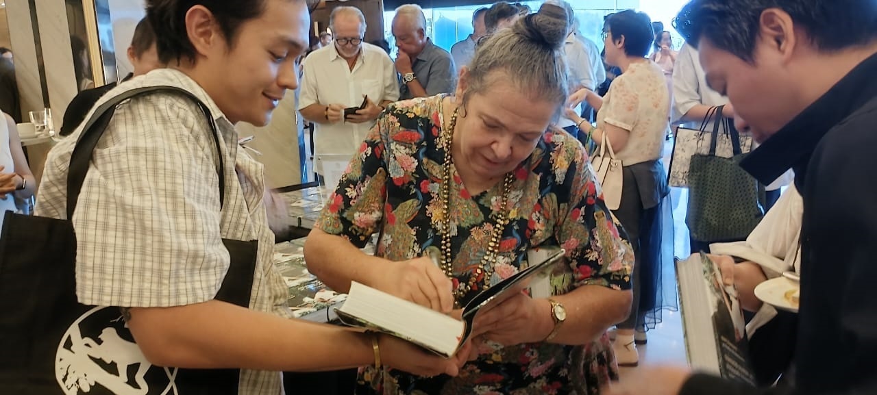 Datin Anthea Phillipps autographs book for Anthony Lamb admirer. 