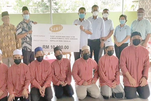 Sawit donates RM10,000 to Sandakan orphanage