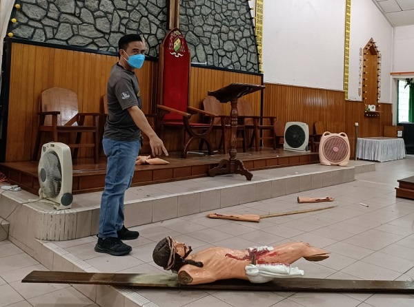 Unidentified man desecrates cross, statues inside Keningau church