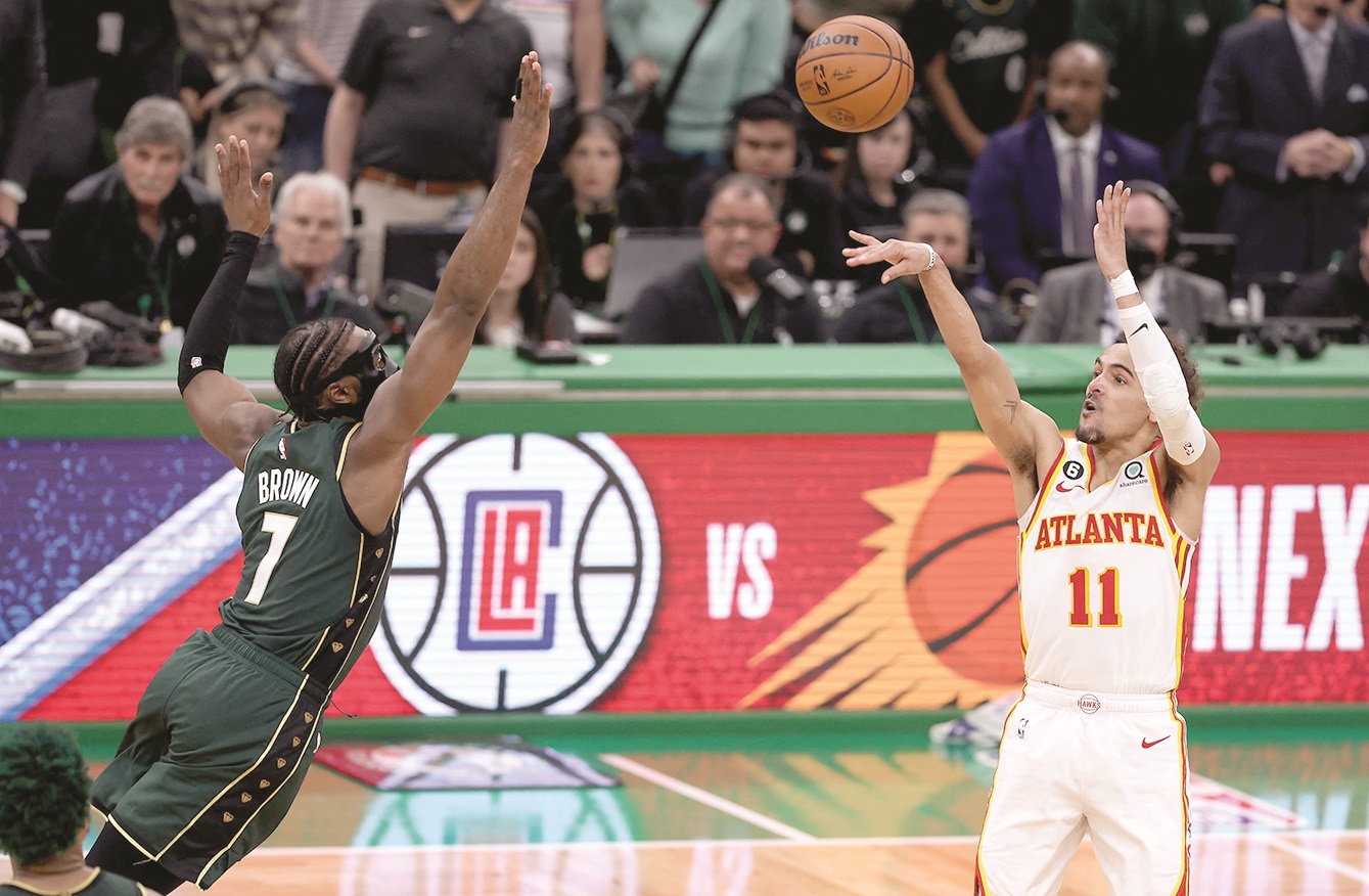 Hawks edge Celtics with Young’s stunner 