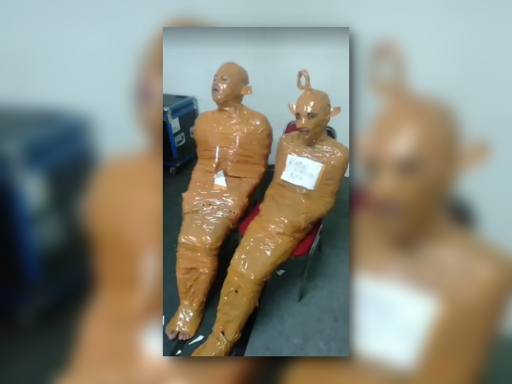 From suspects to spectacle: Tape-wrapped pair spark debate