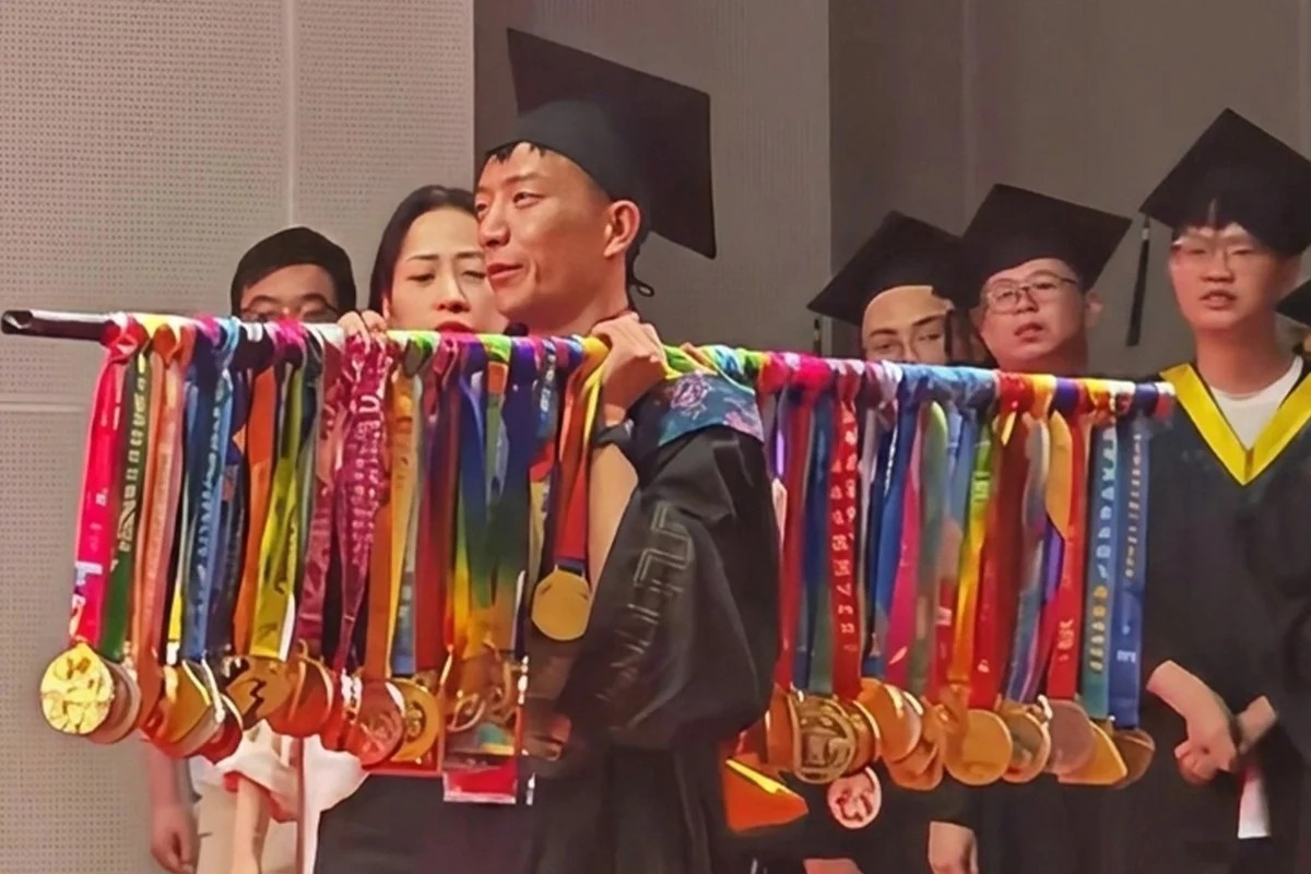 Marathon runner celebrates graduation with 70 hard-earned medals