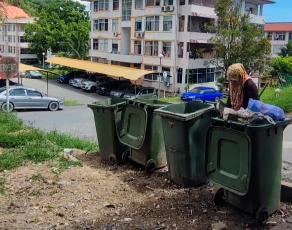 The MC’s cleaners moved the bins for the block a distance away from the carpark.