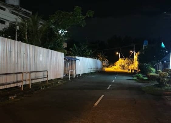 Two homes on this poorly lit road in Tanjung Aru were broken into last year.